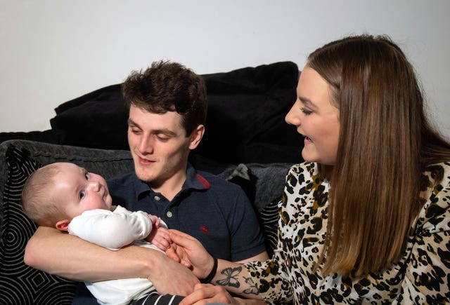 Rosie-Mae Walton and Wes Powell with their son Marley 