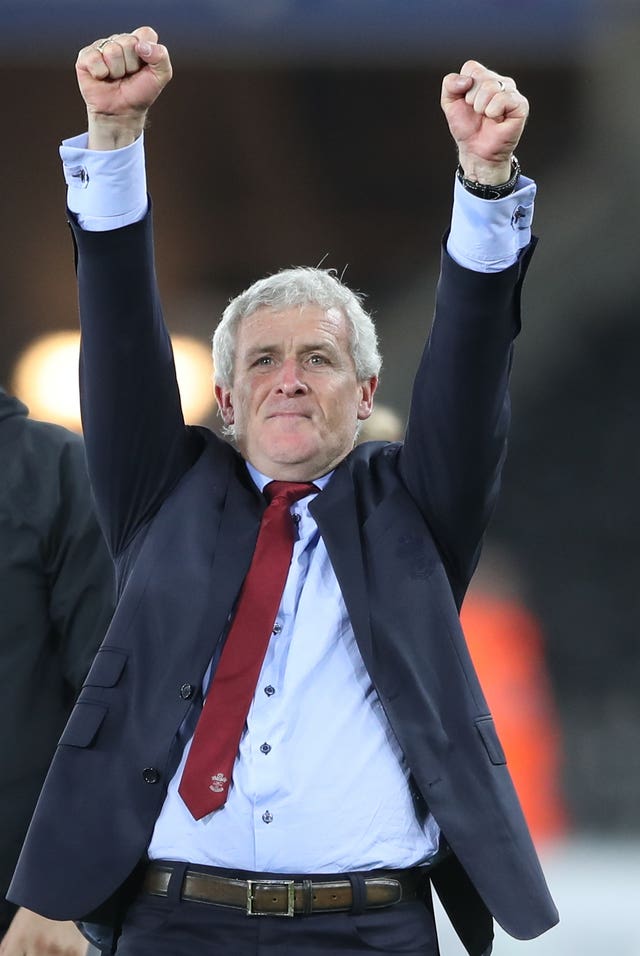 Mark Hughes celebrates victory