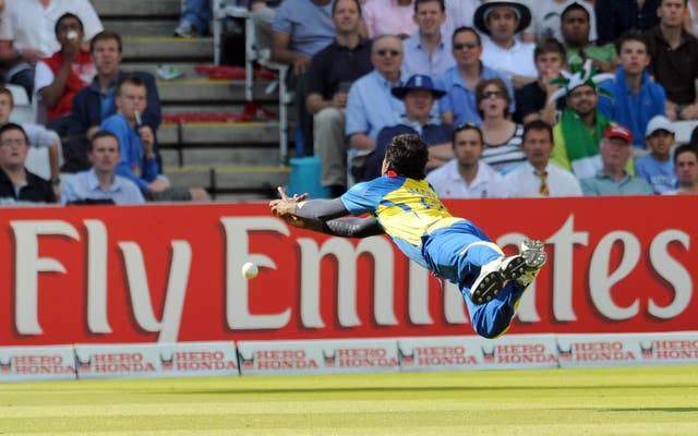 Sri Lanka’s Angelo Mathews dives for a catch