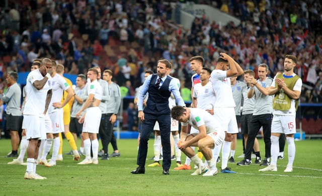 Then England manager Gareth Southgate consoles his players after defeat by Croatia at the 2018 World Cup