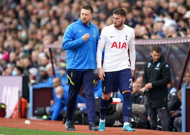 Matt Doherty, right, leaves the pitch for treatment during the Premier League match at Aston Villa