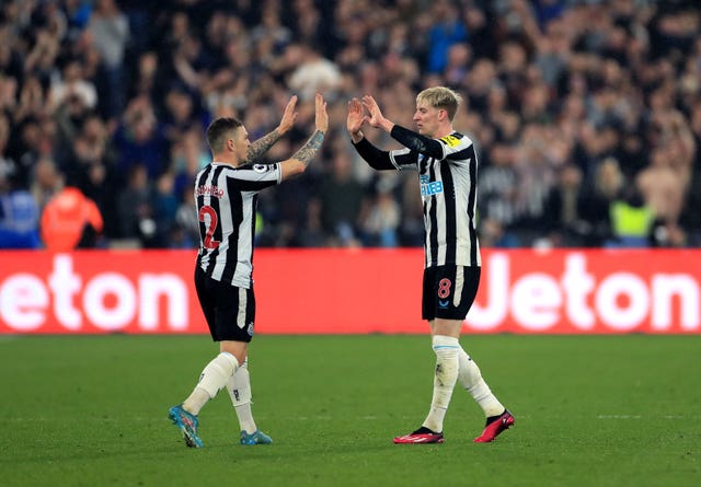 Newcastle United’s Kieran Trippier and Newcastle United’s Anthony Gordon celebrate during the Premier League match at West Ham