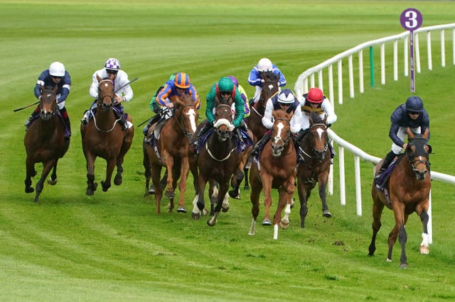 Azazat ridden by jockey Colin Keane (centre) on their way to winning the Captain Dara Fitzpatrick Memorial Maiden during Derby Trial Day at Leopardstown