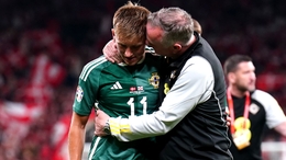 Northern Ireland’s Callum Marshall looks dejected as head coach Michael O’Neill consoles him following the defeat (Zac Goodwin/PA)