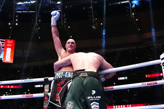 Tyson Fury celebrates victory against Arslanbek Makhmudov