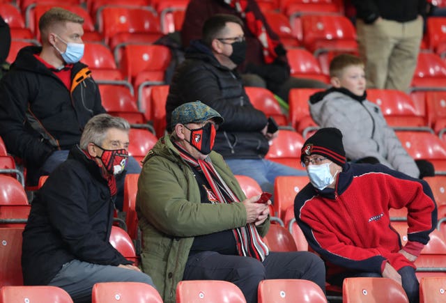 Face masks have become a common sight within football grounds since the start of the pandemic