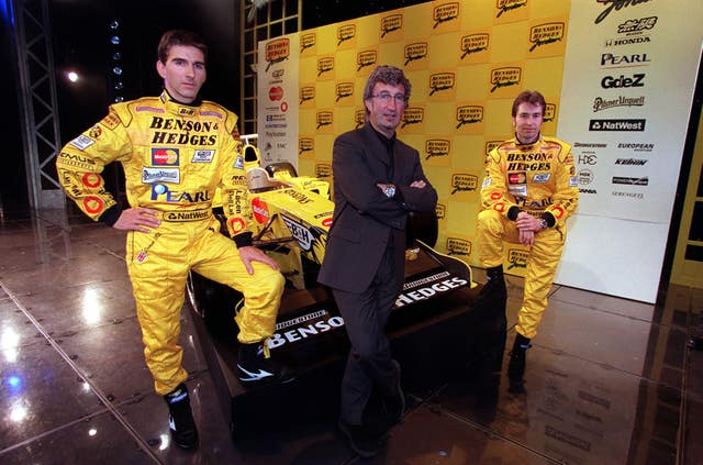 Damon Hill, left, and Heinz-Harald Frentzen, right, pose with Eddie Jordan