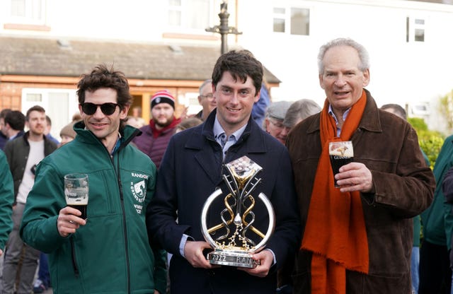 Jockey Sam Waley-Cohen (left), his father Robert Waley-Cohen (right) and trainer Emmet Mullins 