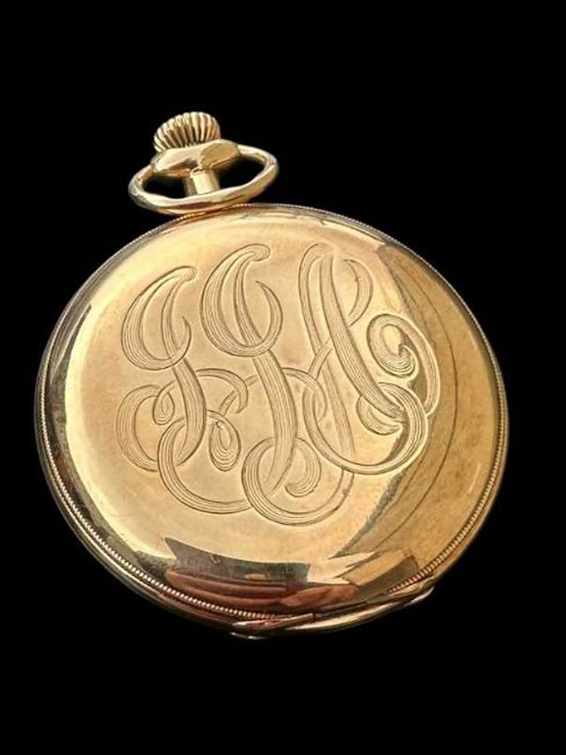 The golden pocket watch engraved with businessman John Jacob Astor's initials