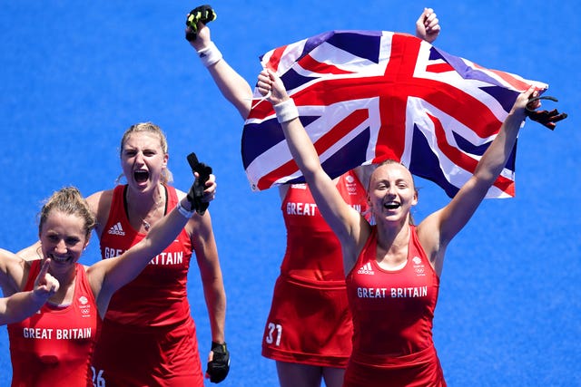 Great Britain’s Lily Owsley, Grace Balsdon and Hannah Martin celebrate winning bronze