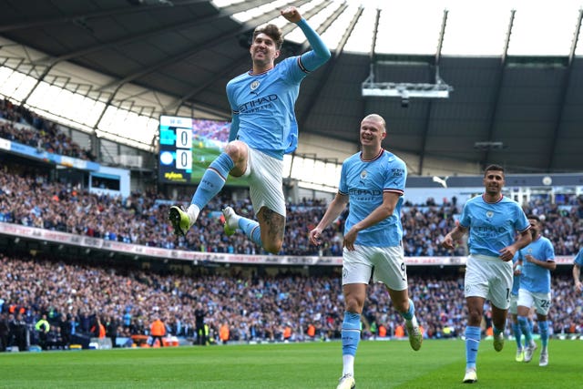 John Stones celebrates scoring against Leicester