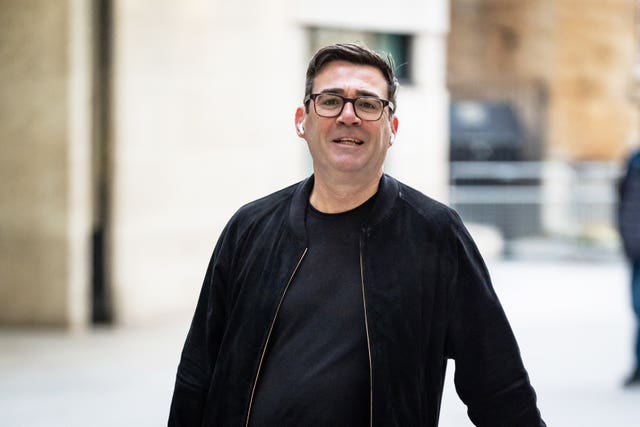 Andy Burnham arrives at BBC Broadcasting House wearing a black T-shirt and jacket