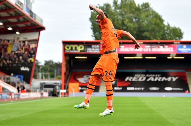 Miguel Almiron celebrates scoring his side’s third goal 