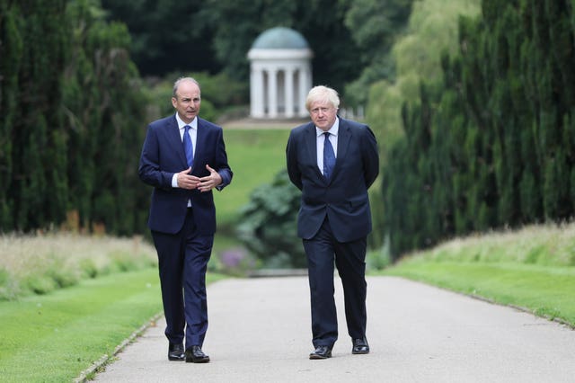 Prime Minister Boris Johnson (right) and Taoiseach Micheal Martin walking in the gardens of Hillsborough Castle (Brian Lawless/PA)