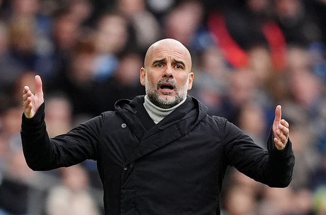Manchester City manager Pep Guardiola gestures on the touchline 