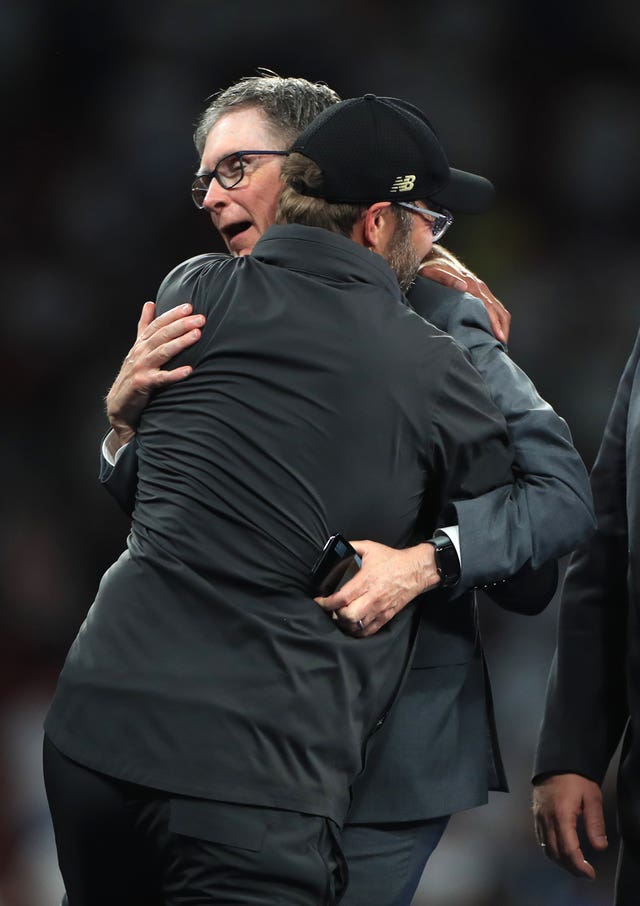 Fenway Sports Group's John Henry is embraced by Jurgen Klopp after Liverpool's Champions League victory