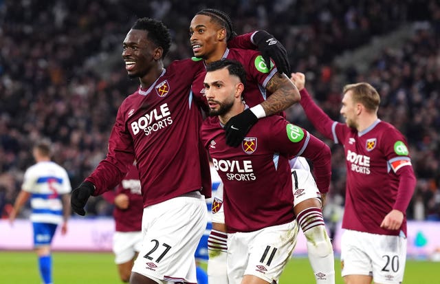 Crysencio Summerville (centre) celebrates the opening goal