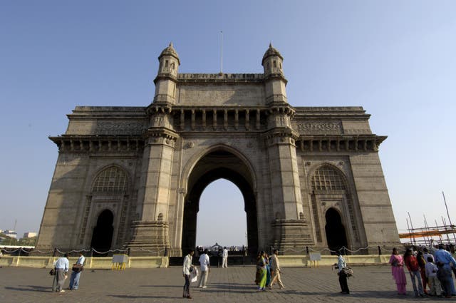 The Gateway of India in Mumbai, the home of Bollywood, where cinemas remain closed because of high death rates (Rebecca Naden/PA)