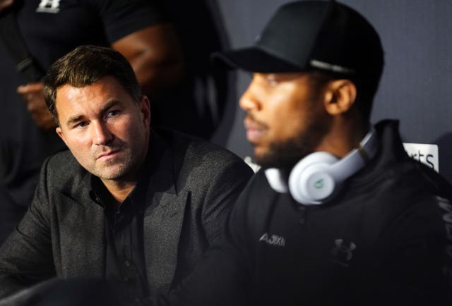 Eddie Hearn and Anthony Joshua face the media