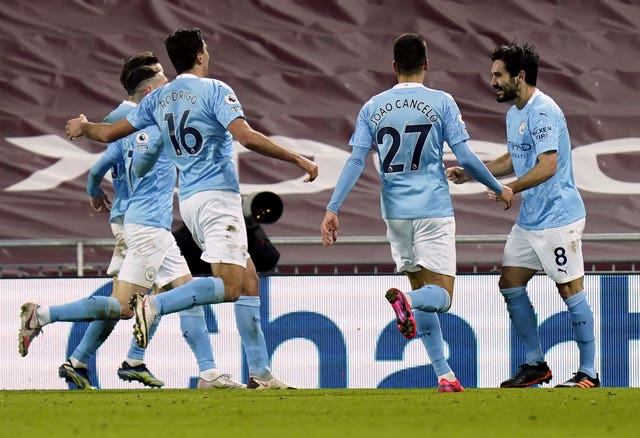 Ilkay Gundogan, right, celebrates his second goal at Anfield