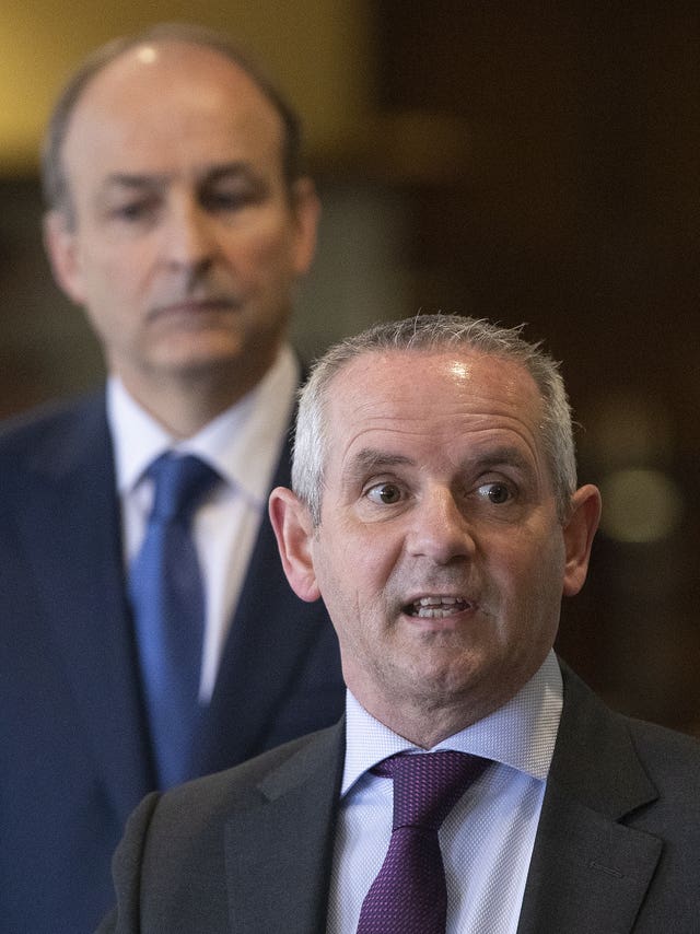 Taoiseach Micheal Martin (left) and Paul Reid, then-CEO of the HSE, in 2021