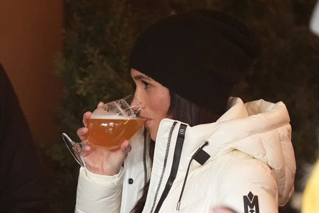 The Duchess of Sussex drinks from a glass whilst attending the 2025 Invictus Games in Whistler, Canada