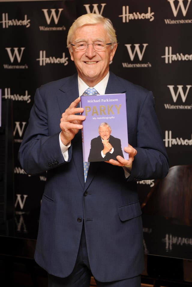 Sir Michael Parkinson signs copies of his autobiography Parky