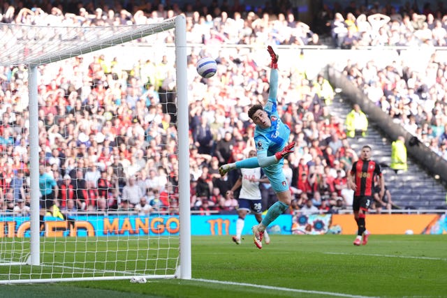 A diving Bournemouth goalkeeper Kepa Arrizabalaga is unable to stop Pape Sarr's cross going into the top corner