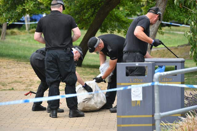 Police searching a park in Salisbury for evidence