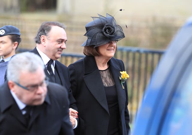 Sir Ken Dodd’s wife Lady Anne and nephew John Lewis arrive ahead of the funeral (Peter Byrne/PA)