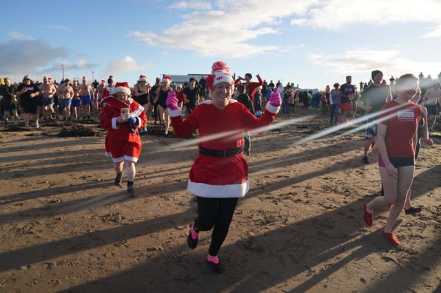 Swimmers take part in the Ayrshire Cancer Support Boxing Day Dip at Ayr Beach
