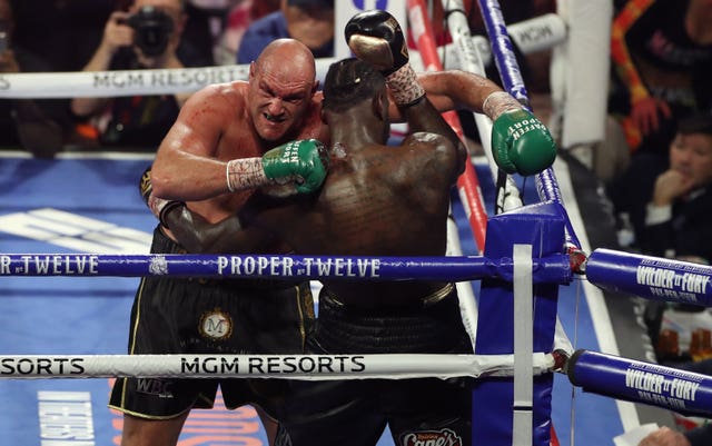 Tyson Fury and Deontay Wilder in their fight