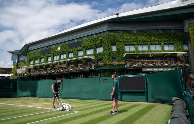 Ground Staff marking the white lines on Middle Sunday in 2021