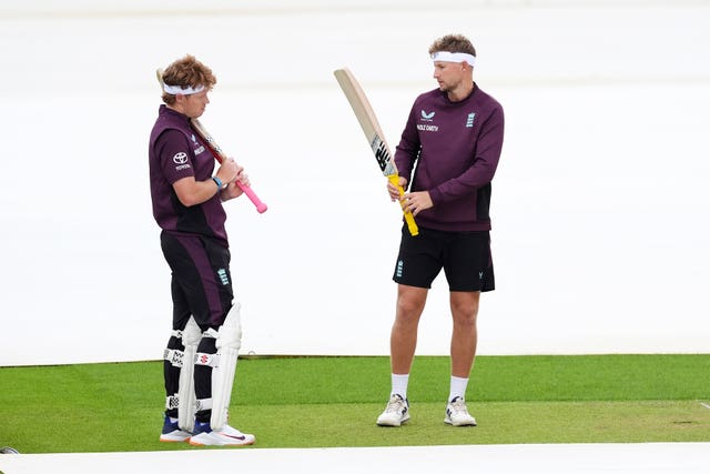 Ollie Pope (left) and Joe Root (right) practising in Graham Thorpe inspired headbands.