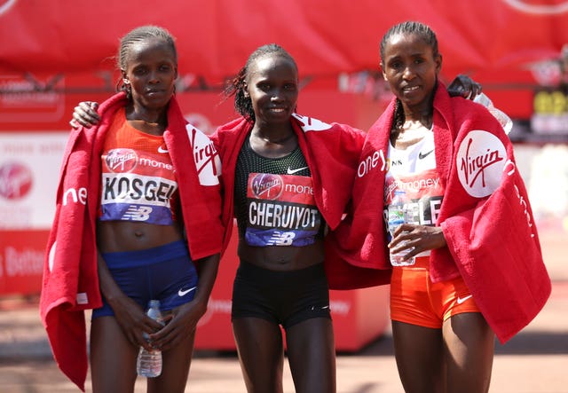 Kenya’s Vivian Cheruiyot (centre) celebrates winning the Women’s London Marathon (Paul Harding/PA)