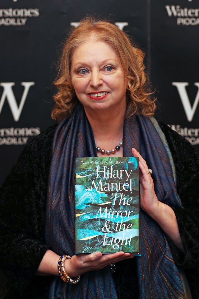 Hilary Mantel with her book The Mirror And The Light 