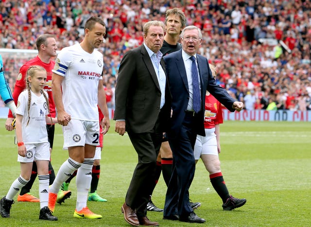 Terry (left) ) and Sir Alex Ferguson (right) walk out before Michael Carrick’s testimonial at Old Trafford
