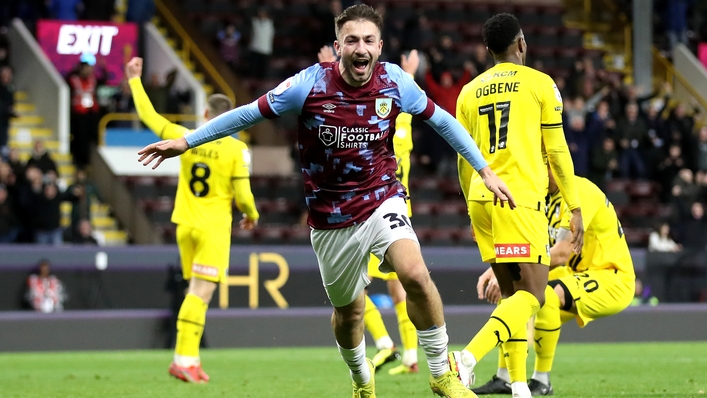 Halil Dervisoglu celebrates his dramatic winner for Burnley (Isaac Parkin/PA)