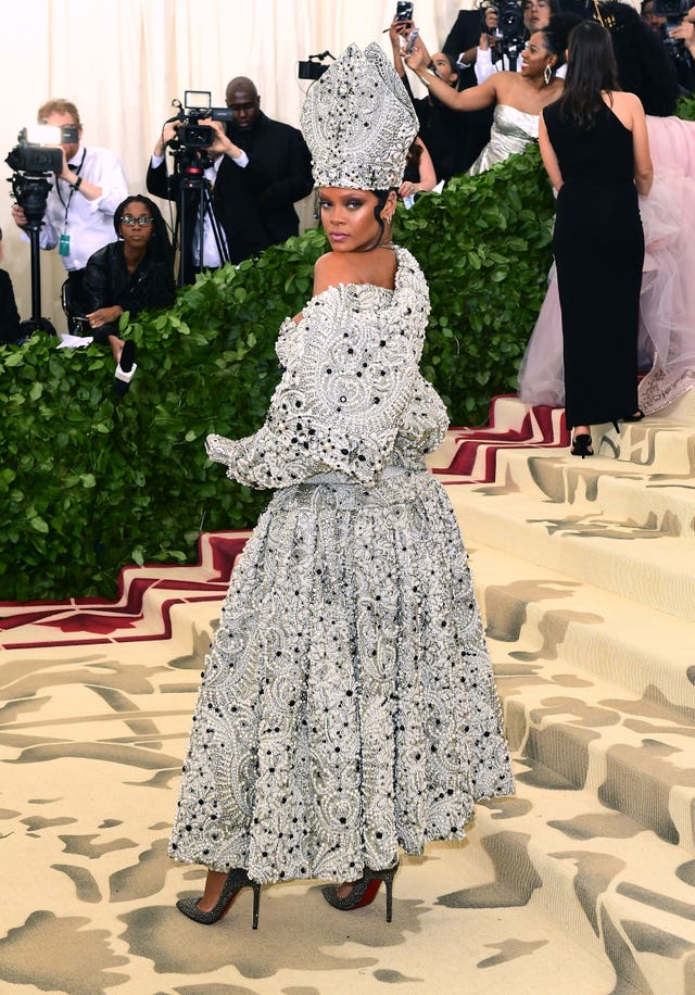 Rihanna Slays in Pope-Inspired Dress and Hat at the 2018 Met Gala