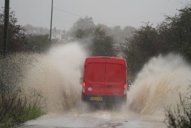 A van drives through floodwater in Whitley Bay