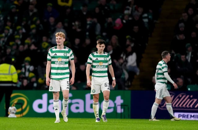 Celtic players react after conceding a goal
