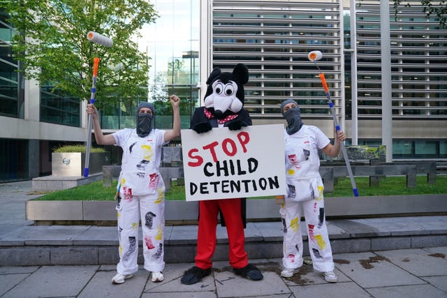 Dom Joly leads a protest outside the Home Office in central London