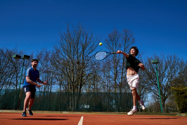 Zak Williams returns a shot at Wycombe House tennis club, Isleworth