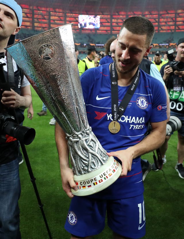 Chelsea’s Eden Hazard celebrates with the trophy after Europa League final victory over Arsenal in Baku