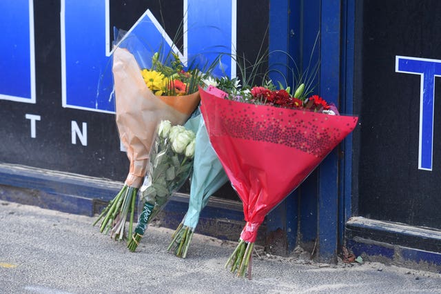 Flowers at the scene of the stabbing (John Stillwell/PA)