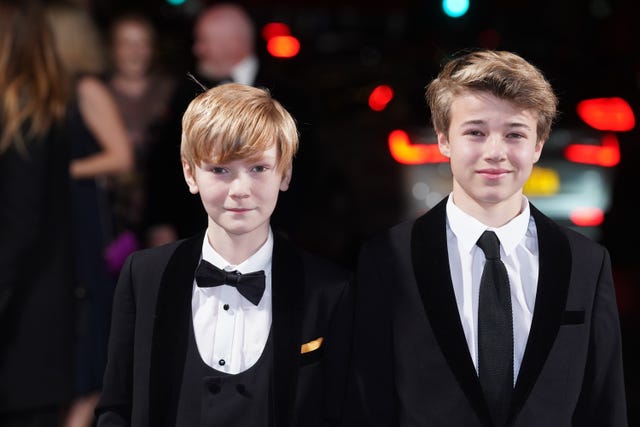 Will Powell and Timothee Sambor arrive at the world premiere of The Crown series five at the Theatre Royal in London
