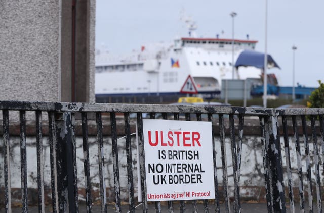 A sign protesting against the Northern Ireland Protocol in Larne Harbour, Northern Ireland 