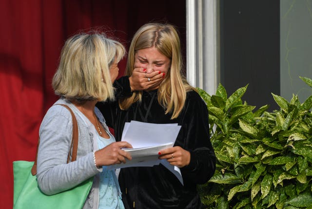 Lara Wells celebrates with her mum Emma after collecting her results at Norwich School
