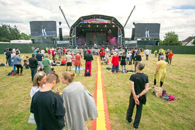 The crowd watch a performance by Levi Roots at Labour Live