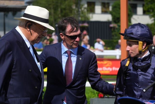 Aidan O'Brien with Ryan Moore and Coolmore boss John Magnier 